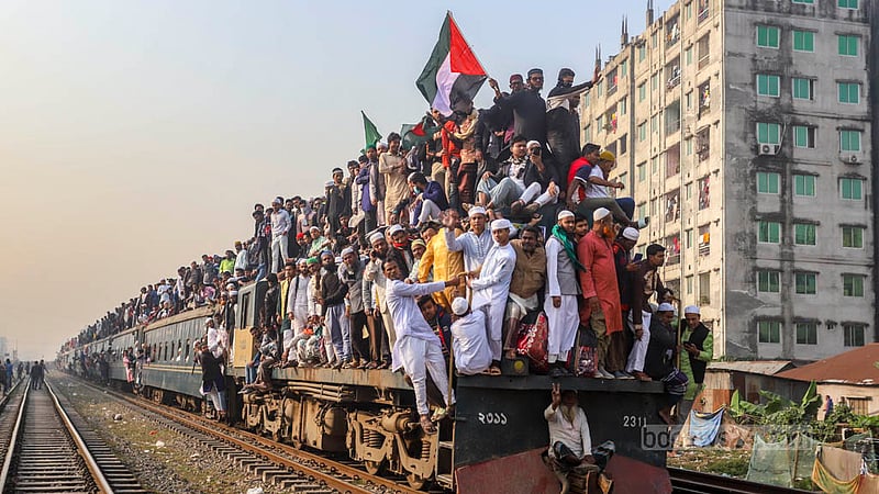 Muslim devotees ride on the roof of a train headed for Tongi on Sunday, Feb 4, 2024 to take part in the Bishwa Ijtema Akheri Munajat.