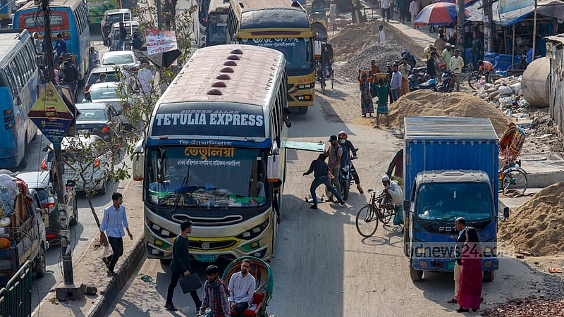 Traffic congestion in the Naya Bazar area is further compounded by the long-distance bus halting on the middle of the street to drop passengers after descending from the Babu Bazar Bridge.