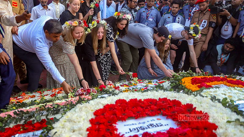 Foreigners pay their respects to the martyrs of the Language Movement at the Central Shaheed Minar on Martyrs Day, also marked as International Mother Language Day, Feb 21, 2024.