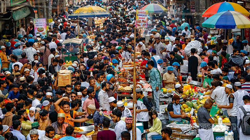 People from various parts of the city converge on Chawkbazar, eager to partake in the traditional Iftar spread to break their fast on the first day of Ramadan on Tuesday, Mar 12, 2024.