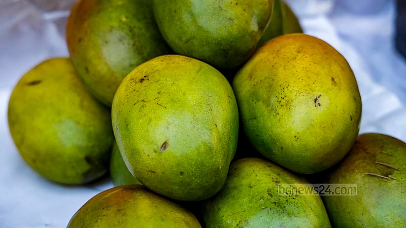From the distant lands of Kenya, green yet ripe mangoes make their mark with a price tag of Tk 1,100 per kg in Dhaka’s Paltan.