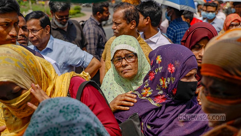 Women stand in long queues at the capital's Khamarbari intersection from 10 am on on Wednesday, Mar 13, 2024, to buy milk, eggs and meat at cheaper rates.