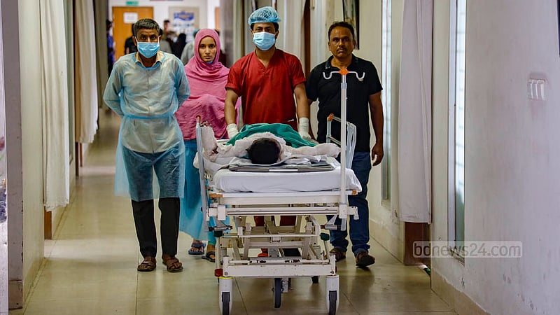 Tayeba, a young victim of a gas cylinder explosion in Gazipur's Kaliakair, is currently being treated at the Sheikh Hasina National Institute of Burn and Plastic Surgery. She has sustained burns on 80 percent of her body. Following the dressing of her wounds, she has been moved to the post-operative care room for further treatment.