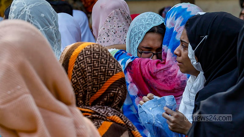 Students of Viqarunnisa Noon School and College shed tears during the funerals of teacher Lutfun Nahar Karim Lucky and her daughter Jannatin Tajri Nikita, a former student of the institution, after their deaths in a fire at a restaurant building on Bailey Road.
