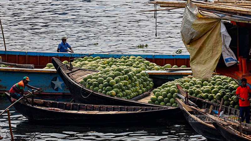 Vessels carrying watermelons wait to be unloaded at Dhaka’s Waisghat.