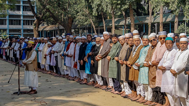 Funeral prayers for Viqarunnisa Noon School and College teacher Lutfun Nahar Karim Lucky and her daughter Jannatin Tajri Nikita, a former student of the institution, are held at the college ground after their deaths in a fire at a restaurant building on Bailey Road.