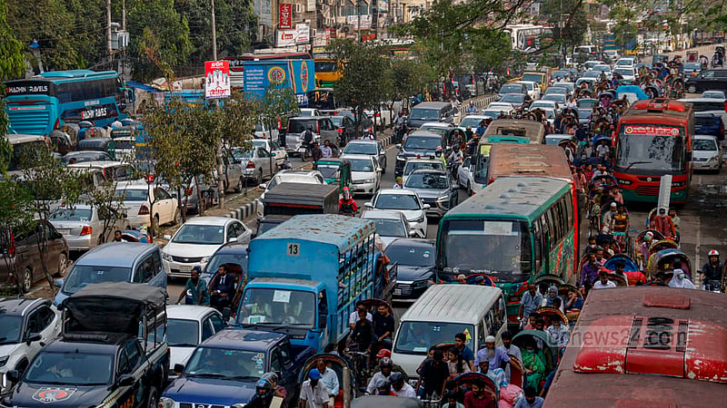 The street outside Notre Dame College is gridlocked with traffic, with no vehicles moving on Thursday afternoon, Mar 28, 2024, due to the congestion.