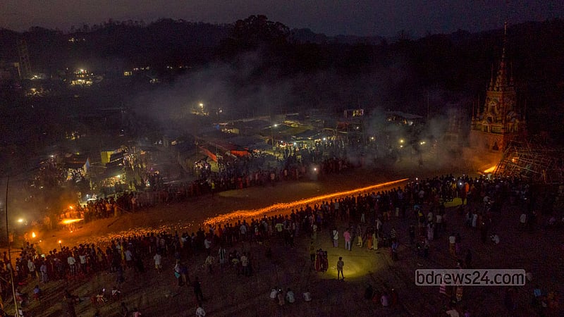 A firework is used to light the tomb of Mahathero. Buddhists believe a monk has to initiate the ritual. The cremation process took two days to complete.