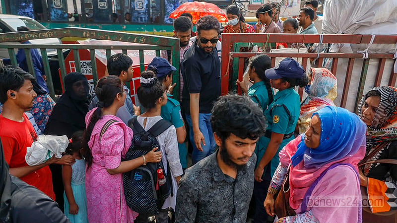 There is a footbridge in front of Balaka Cinema Hall in Dhaka's New Market area but most shoppers risk their lives to cross the street outside nearby Gausia Market and New Market through the broken jersey barrier.