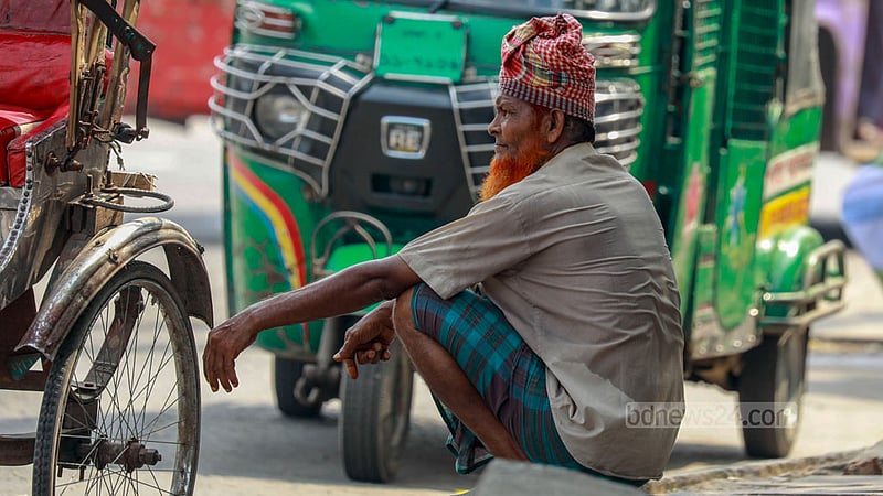A rickshaw puller stops his vehicle to rest and find relief from the intense heat under a tree's shade on Thursday afternoon, Apr 18, 2024.