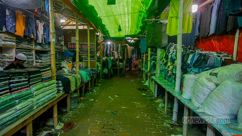 Buyers throng shopping malls and markets in Dhaka and across the country ahead of Eid, but few are coming to the Bangabazar market.