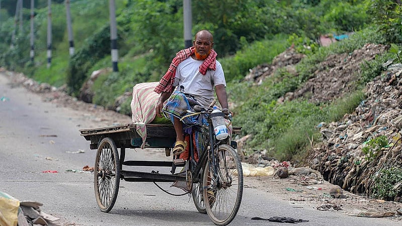 Vegetables grown in the landfill at Matuail are being transported to the market on a three-wheeler for sale. Photo: Abdullah al Momin