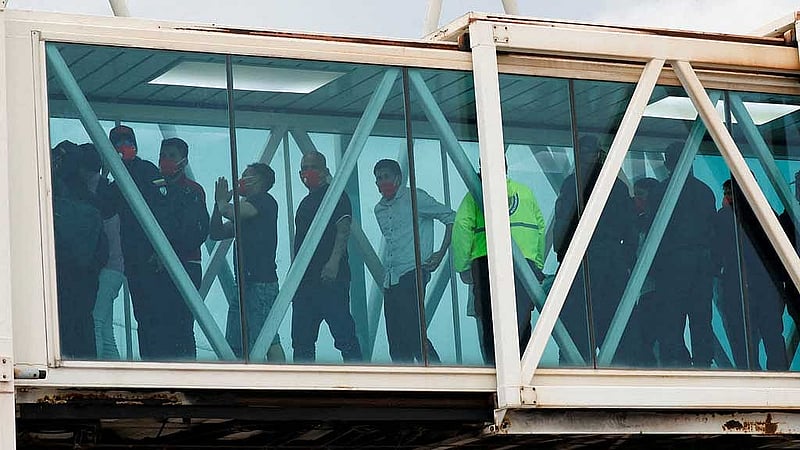Venezuelan migrants arrive after being deported from the United States, at Simon Bolivar International Airport, in Maiquetia, Venezuela April 23, 2025. REUTERS