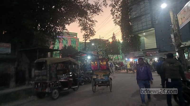 Green and red lights illuminate the street ahead of Victory Day in Rangpur. Credit: Samiha Mehbub Hiya