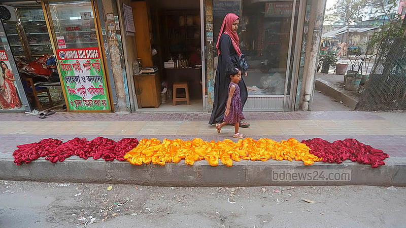 Colourful threads are displayed for sale outside a shop at Benarasi Palli in Dhaka’s Mirpur. Photo: Abdullah al Momin