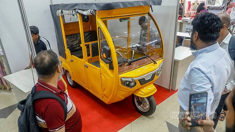 A locally made solar-powered autorickshaw on display at a stall in the South Asia Trade Fair at the International Convention City Bashundhara.  Photo: Abdullah Al Momin