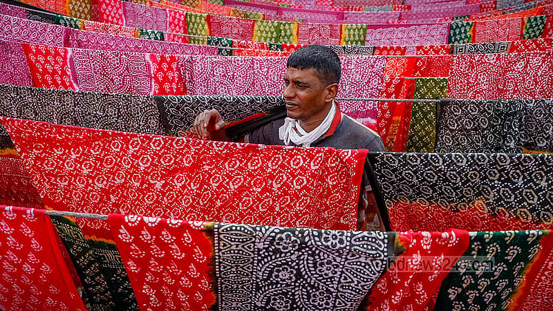 Dyed batik fabric is used to make women’s three-piece outfits, as well as bed linen, pillowcases, curtains and other household items in Narayanganj's Banti village. Photo: Mahmud Zaman Ovi