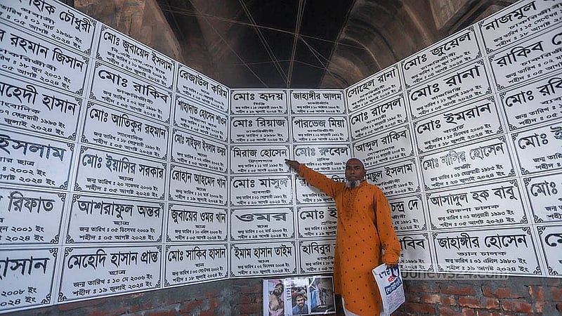 Miraz Hossain was shot dead by police outside the Jatrabari Police Station during the Anti-discrimination Student Movement on Aug 5. The victim’s father showing his son’s name inscribed on the “Shahidi Oikya Chattar” memorial. Photo: Abdullah al Momin