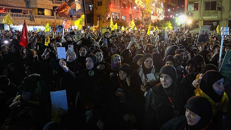 Hezbollah supporters gather at the site where the group's late leader Hassan Nasrallah was killed, before the first anniversary of his assassination in an airstrike, in Beirut's southern suburbs, Lebanon, Sept 26, 2025. REUTERS