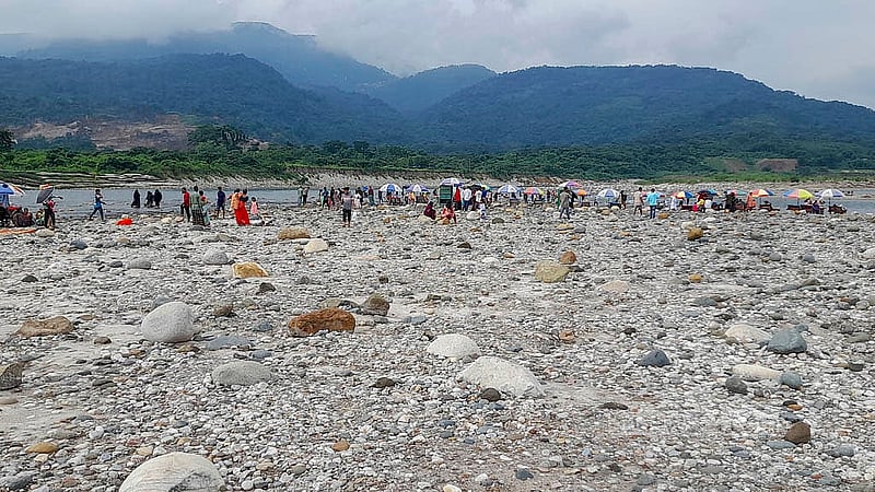 Stones have been stolen from Shada Pathar in Sylhet’s Bholaganj. Only a handful remain to greet the tourists who continue to visit. Photo: Bappa Maitra