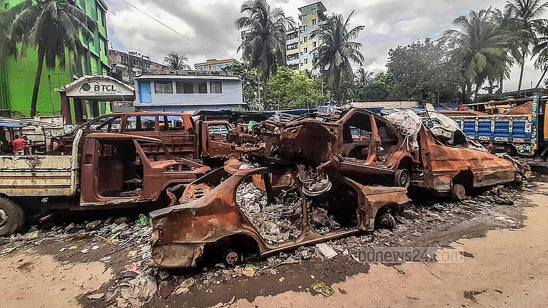 The vehicles outside Jatrabari Police Station in Dhaka were seized on different charges or after accidents, and most were burned during the July Uprising. Photo: Abdullah Al Momin