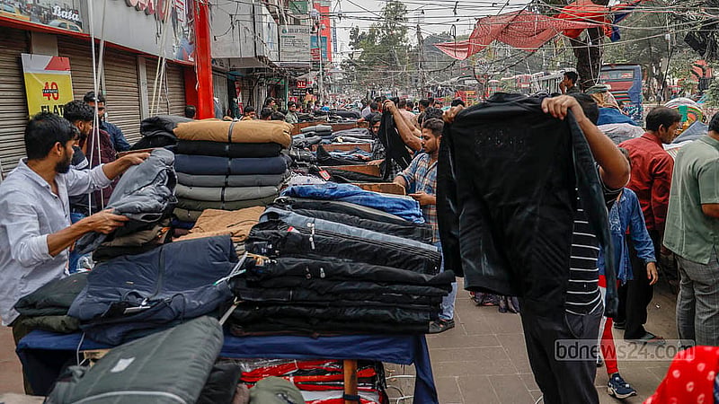 Hawkers have set up shop on the footpath in Dhaka’s Mirpur-10 area wherever they find any space. Photo: Mahmud Zaman Ovi