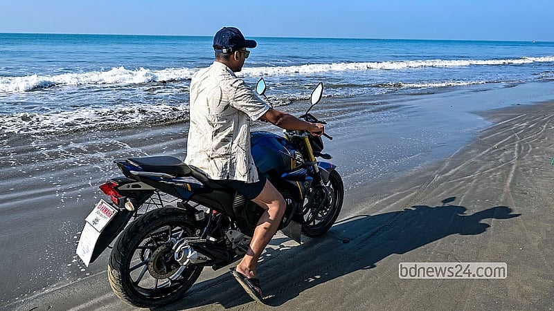 A tourist rides a motorcycle along the western beach of St Martin’s Island. Despite the ban, visitors can easily rent motorcycles after arriving on the island. Photo: Muhammad Mostafigur Rahman