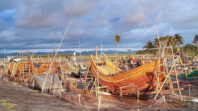 Woods such as Garjan, Akashmoni, Mahogany, and Rain Tree are used to build sea fishing trawlers. It takes about two to three months to construct a new boat. Photo: Jasim Mahmud