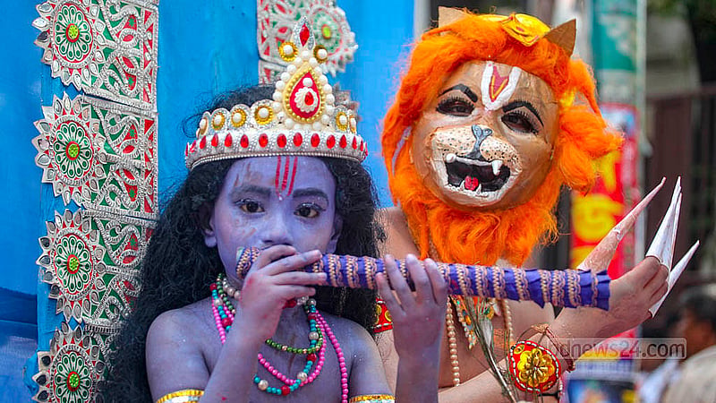 On the occasion of the birth anniversary of Lord Krishna, the Hindu faithful dressed in different costumes participate in a procession at the Palashi intersection on Saturday, Aug 16, 2025. Photo: Abdullah Al Momin