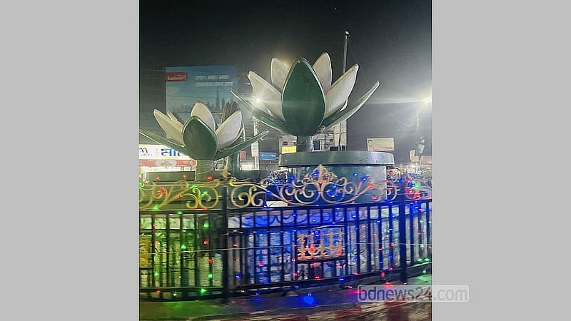 Bright lights decorate the Shapla Chattar in Rangpur on the eve of Victory Day. Collected: Samiha Mehbub Hiya