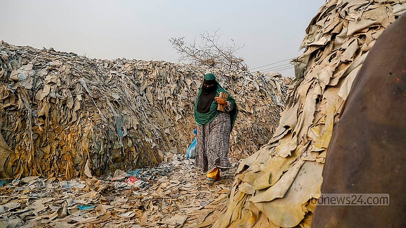 Waste leather has been stacked along both sides of a road near a bone factory in Hazaribagh’s Kalunagar. Photo: Mahmud Zaman Ovi