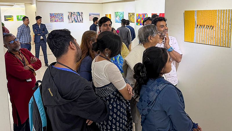 Visitors tour the photography exhibition titled “Love and Life Through My Eyes” at Dhaka’s Bishwo Shahitto Kendro (BSK).
