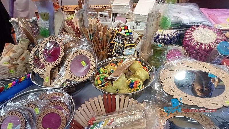 Mirrors, toys, and other trade goods are on display at the Rangpur Industry and Trade Fair 2025.