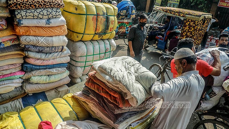 There are 20-25 wholesale shops selling old winter clothes in the Sadarghat area of Old Dhaka. Photo: Abdullah Al Momin
