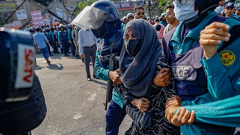 Police detain several protesters demanding the reinstatement of cancelled appointment for primary school assistant teacher during a sit-in demonstration at Shahbagh Intersection on Thursday, Feb 13, 2025. Photo: Mahmud Zaman Ovi