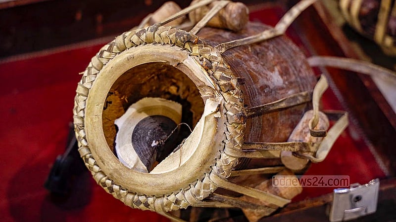 Destroyed musical instruments have been placed near the entrance inside Chhayanaut following the attack on Dec 18, 2025. Photo: Mahmud Zaman Ovi