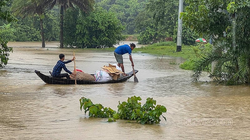 The low-lying areas of Khagrachhari’s Dighinala have been flooded after continuous rain. The water has risen since Wednesday morning and the headquarters area of the Khagrachhari-Langadu road has been submerged on Thursday, Jul 10, 2025. Photo: Samir Mallik