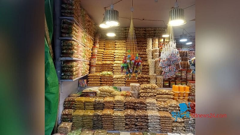 Traditional festive foodstuffs are on display at the Rangpur Industry and Trade Fair 2025.