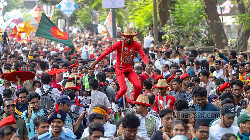 Scores of people dance and sing as they join the Ananda Shobhajatra on Monday, Apr 14, 2025. This year’s vibrant procession marched under the theme of “New Year’s Harmony, Fascism’s End”. Photo: Abdullah Al Momin