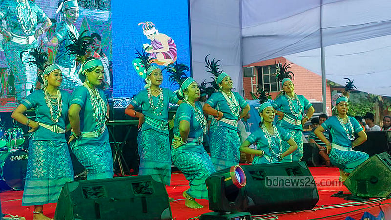 Garo people performed a dance focusing on hilly Jhum cultivation at the Wangala festival on Friday, Oct 24, 2025, at Banani Vidyandiketan School and College grounds. Photo: Abdullah al Momin