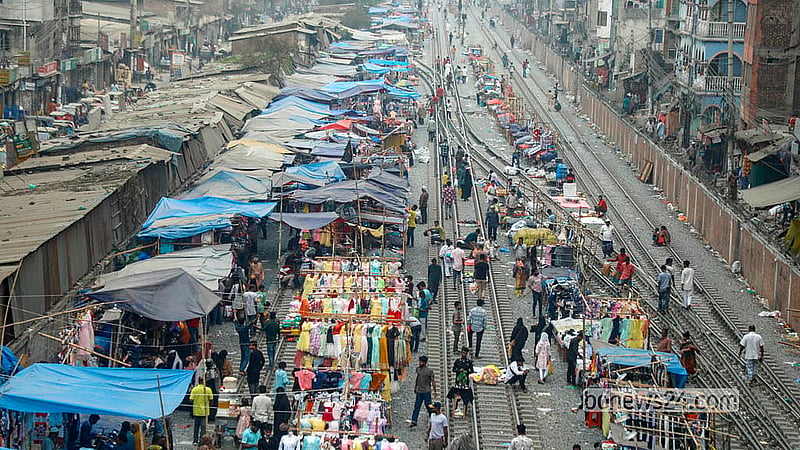 Ahead of Eid, makeshift shops spread across half a kilometre of Jurain railway tracks. Photo: Abdullah al Momin