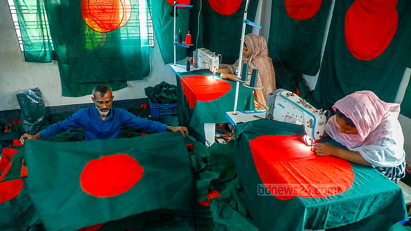 Artisans in Kadamtali work tirelessly stitching red-and-green national flags.Photo: Abdullah Al Momin