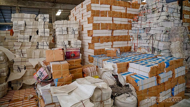 The printing of secondary school books is underway at a printing press in Dhaka’s Matuail. A press management official said printers have fallen behind schedule due to the delay in receiving the book orders from the education board. Photo: Mahmud Zaman Ovi
