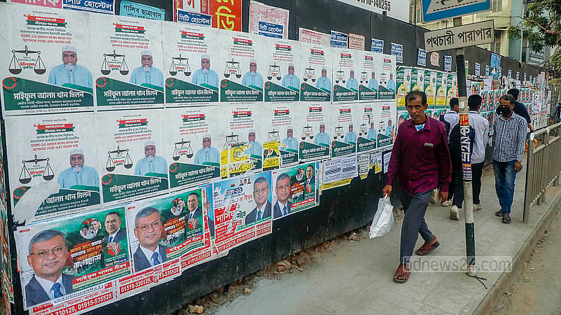 Tejgaon, too, is covered with campaign posters. Even though pre-schedule postering is banned, no one is following the rule. Photo: Abdullah Al Momin