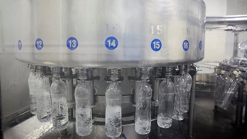 Natural water is filled into PET (Polyethylene Terephthalate) bottles at a bottling machine at Tata's Himalayan natural mineral water bottling plant in Dhaula Kuan, Himachal Pradesh, India, October 16, 2025. REUTERS