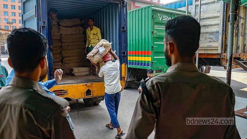 Under police security, sacks of referendum ballot papers are being loaded onto trucks from the Willes Little Flower School and College polling centre on Sunday, Feb 8, 2026. Photo: Mahmud Zaman Ovi