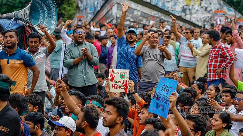 Protesters block Shahbagh intersection in Dhaka with slogans and placards to protest attacks on minorities on Saturday, Aug 10, 2024. Photo:Mahmud Zaman Ovi