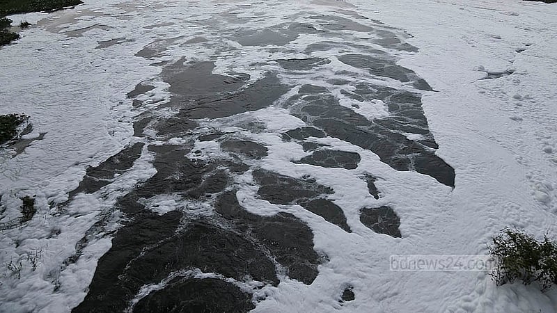 The black, chemical-laden water from the Mirpur factories takes time to mix with the river water. As more waste is dumped into the river, it changes the appearance of the water. Photo: Mahmud Zaman Ovi