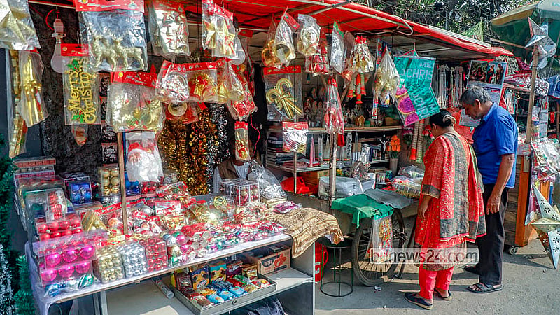People flock to buy Christmas decorations outside Dhaka’s Holy Rosary Church. Photo: Abdullah Al Momin
