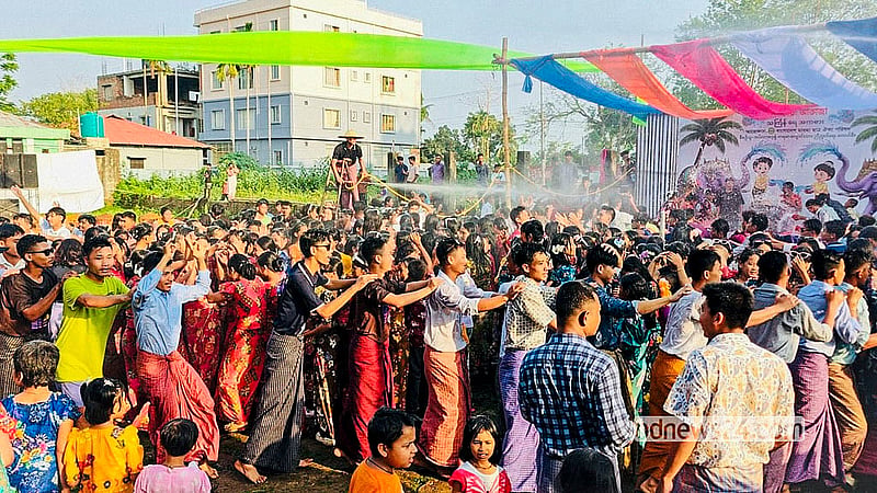 Marma youths revel in traditional water games during the Sangrai festival at the TTC ground in Khagrachhari town on Wednesday, Apr 15, 2026. Photo: Samir Mallik